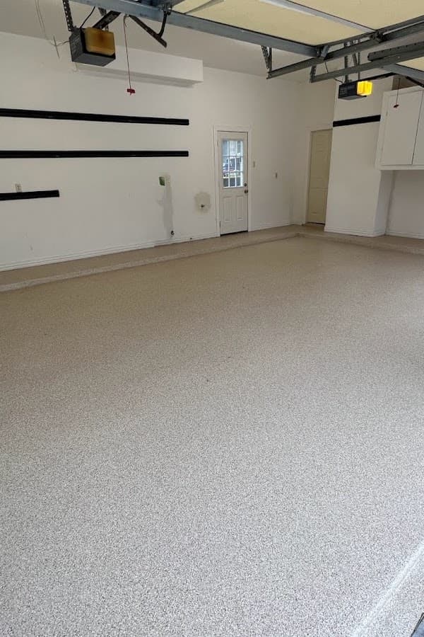 The same garage after a glossy polyaspartic flake coating